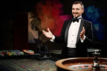 A glowing roulette wheel with cascading chips, symbolizing the engaging live and instant-win games available on STARMAX88.