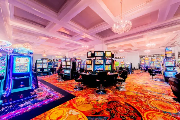 A laptop glowing with a bright login prompt in a minimalistic setup, symbolizing the protected access system at STARMAX88.