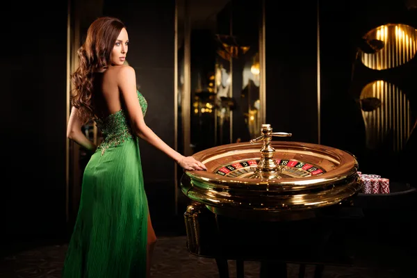 A person using their device against a moody casino-themed background, illustrating the smooth re-entry process at STARMAX88.